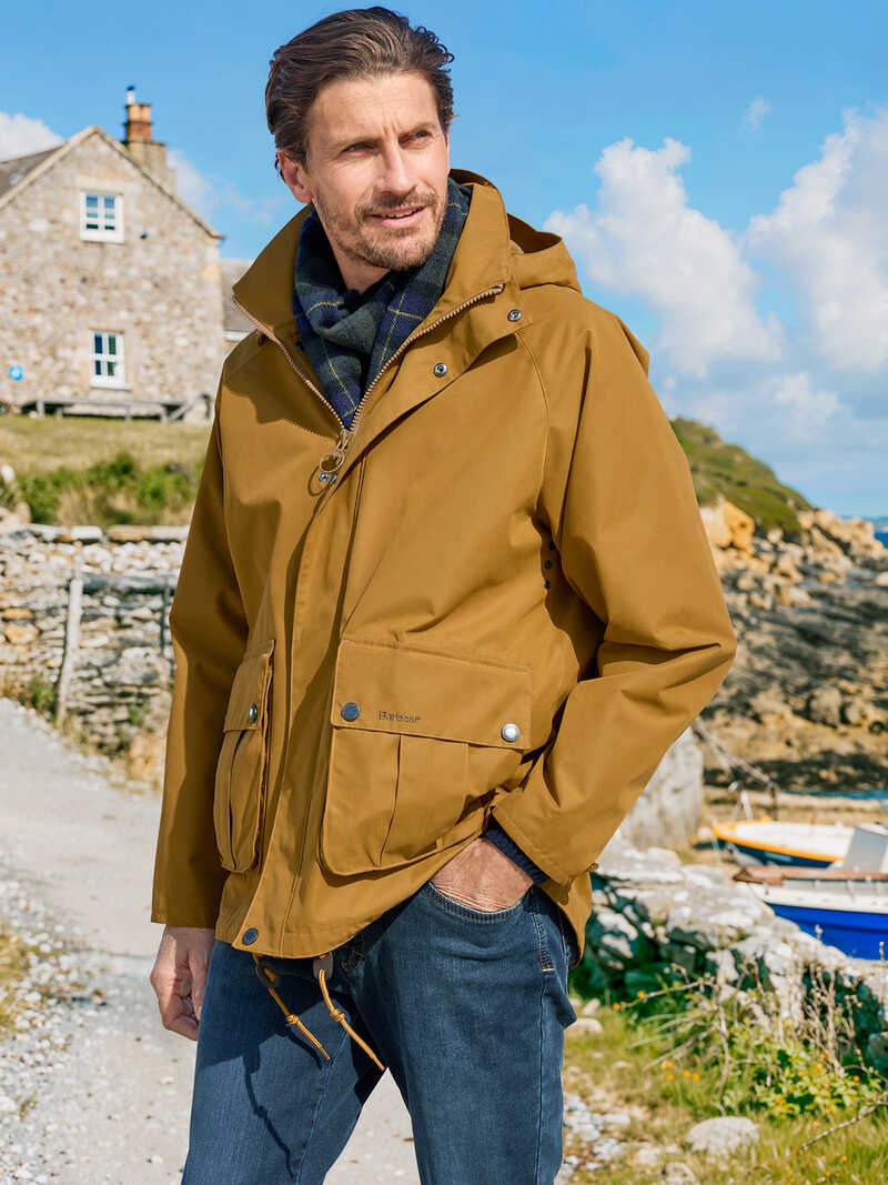 Produktbild zu Gelbes Showerproof Jacket