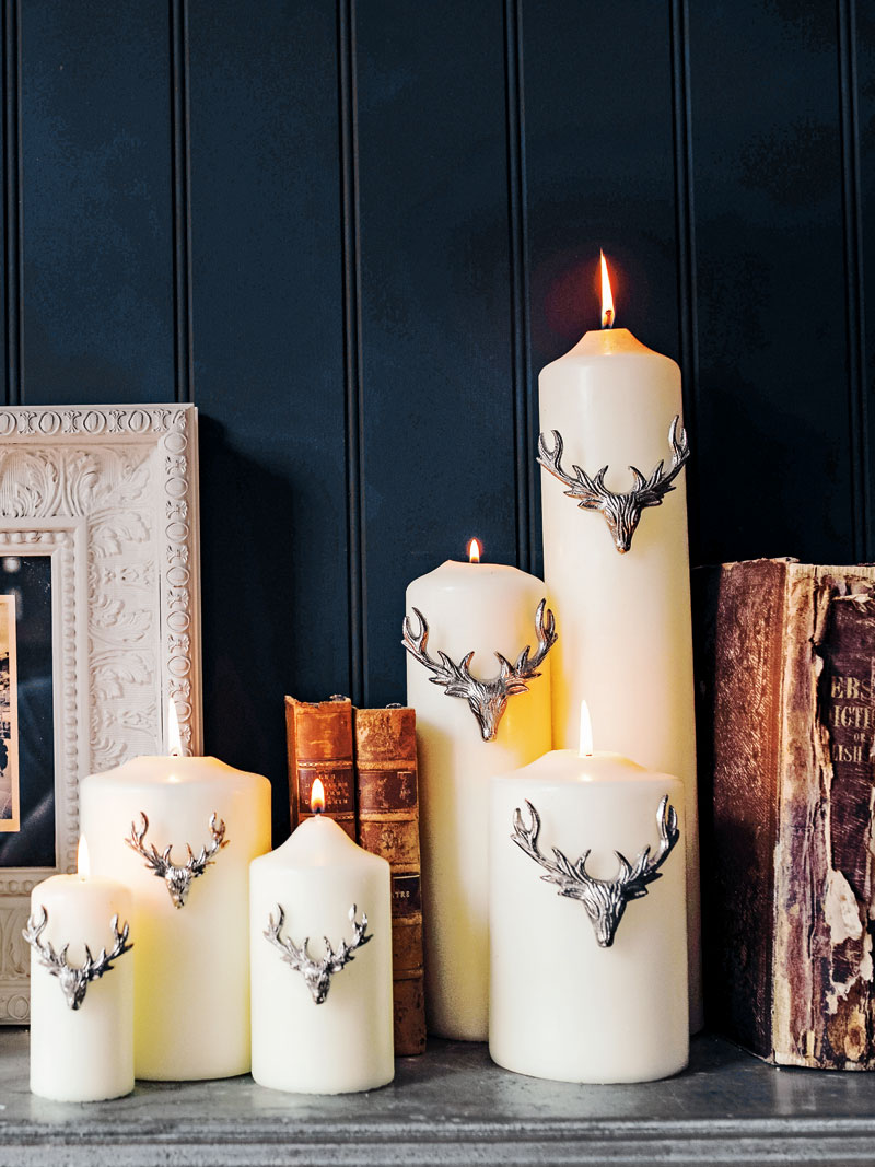 Produktbild zu Kerzenstecker mit Hirsch